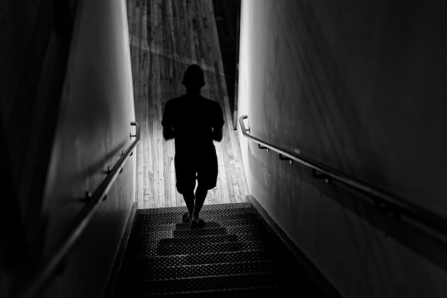 Strong Contrast Black and White photograph of Paris descending staircase.